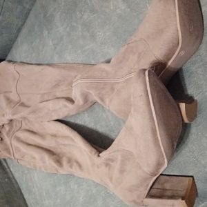 A brown Wild Diva over the knee boots.